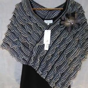 Black Tank top with a Ruffled Shaw attached.